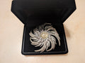 Vintage Designer Swirl Starburst Brooch: Sarah Coventry