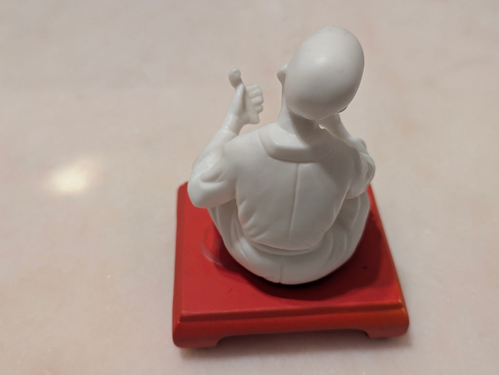 Chinese Bisque Porcelain Scholar Figurine on Red Display Stand – Blanc de Chine Style