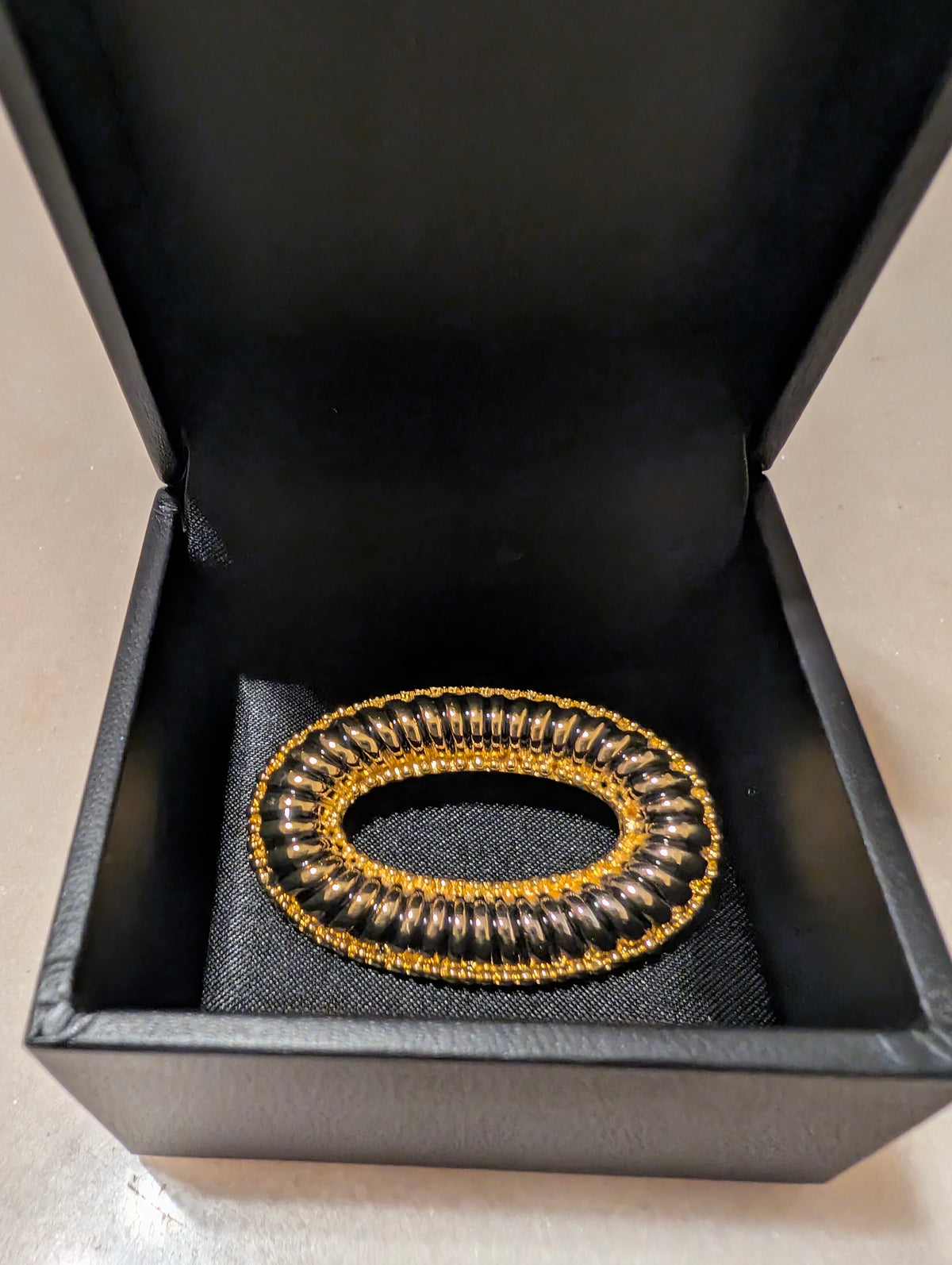 Vintage Black Enamel Gold Tone Oval Brooch