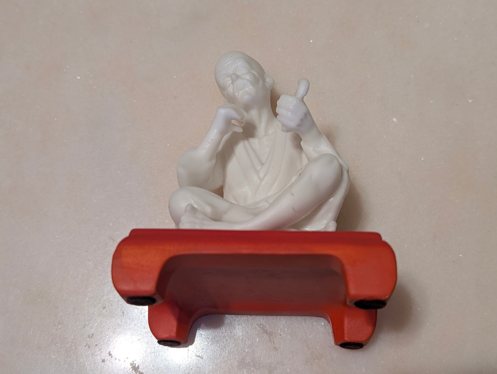 Chinese Bisque Porcelain Scholar Figurine on Red Display Stand – Blanc de Chine Style